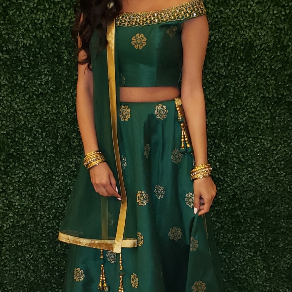 Emerald green and gold lengha. Indian/Pakistani dress/suit.